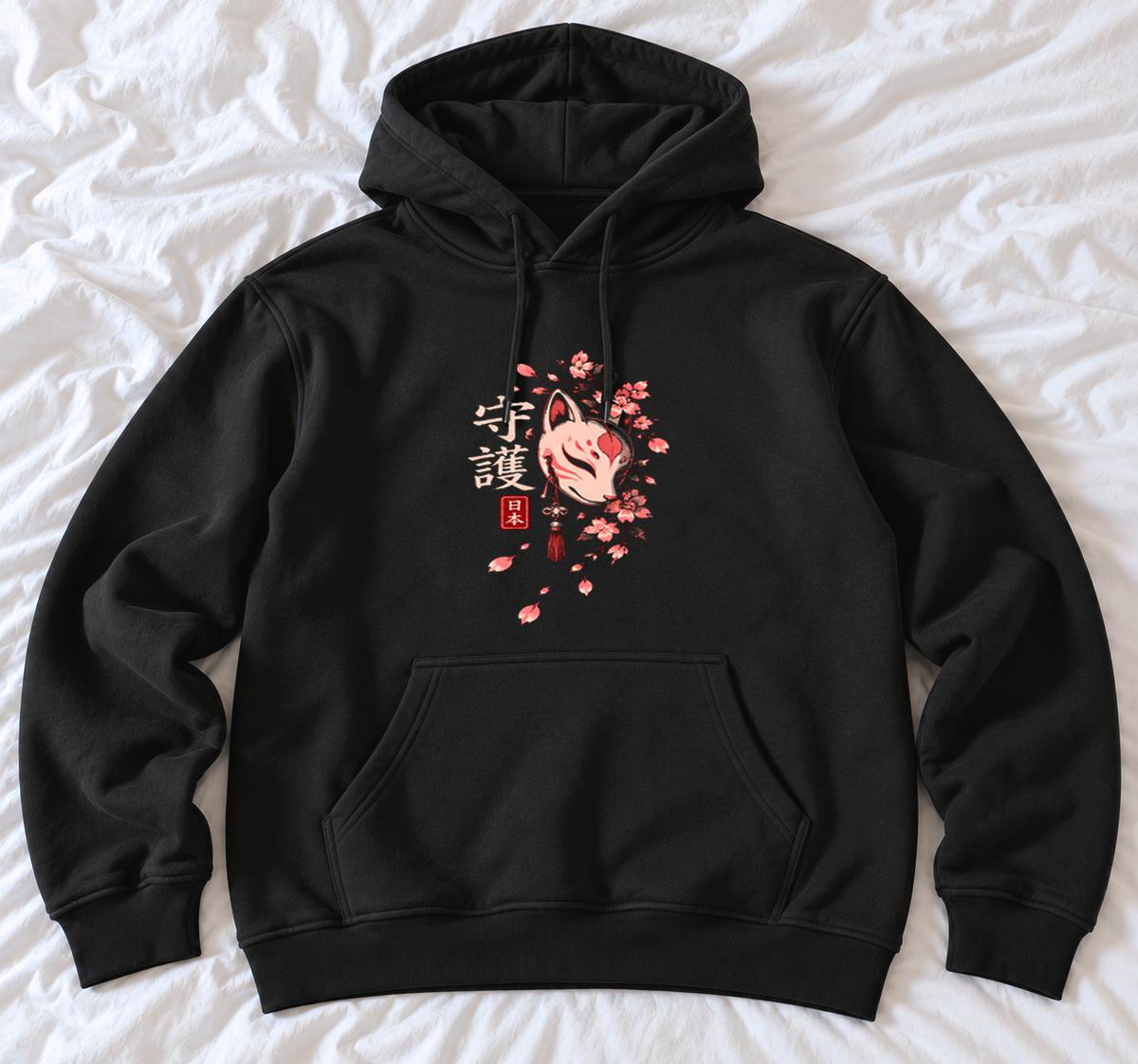 Zwarte Zen Moment hoodie, voorkant op wit laken: vossenmasker met rood kwastje, sakura, kanji 守護 en 日本-zegel